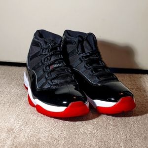Air Jordans 11 Retro Black and Red Men's size 9.5
